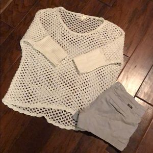 Open knit sweater from the buckle.